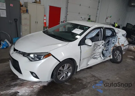 2014 Toyota Corolla Le Eco Plus z USA, uszkodzony, nr VIN 5YFBPRHE0EP142287